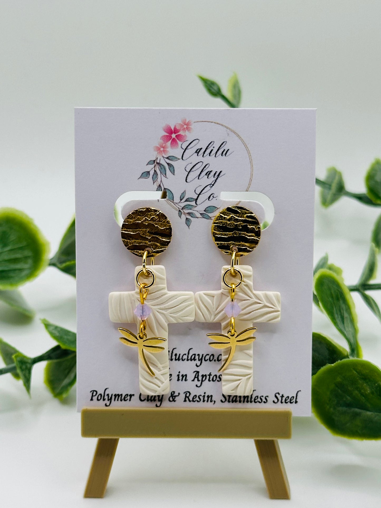 White Leaf Embossed Cross with Dragonflies Dangles