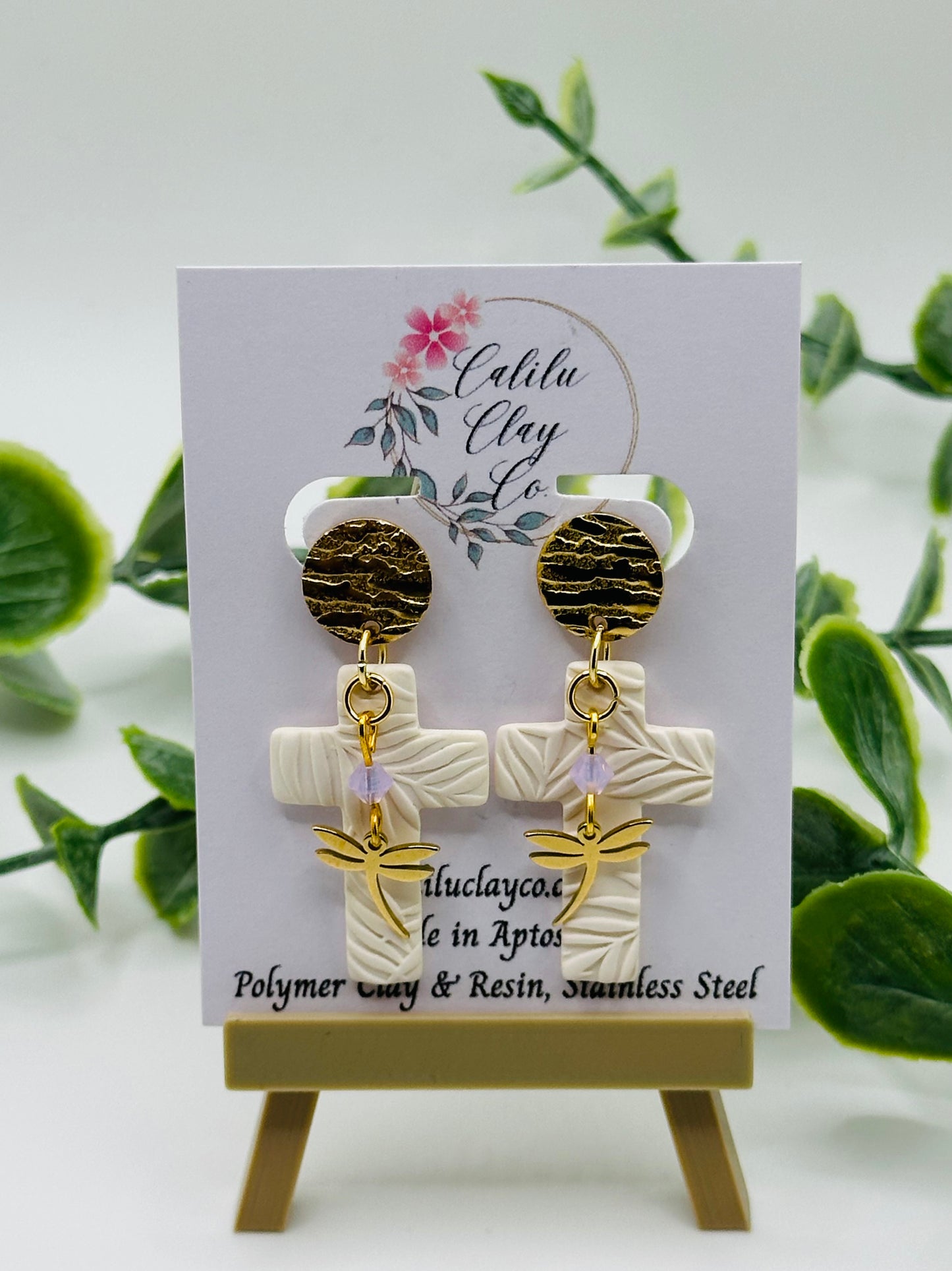 White Leaf Embossed Cross with Dragonflies Dangles
