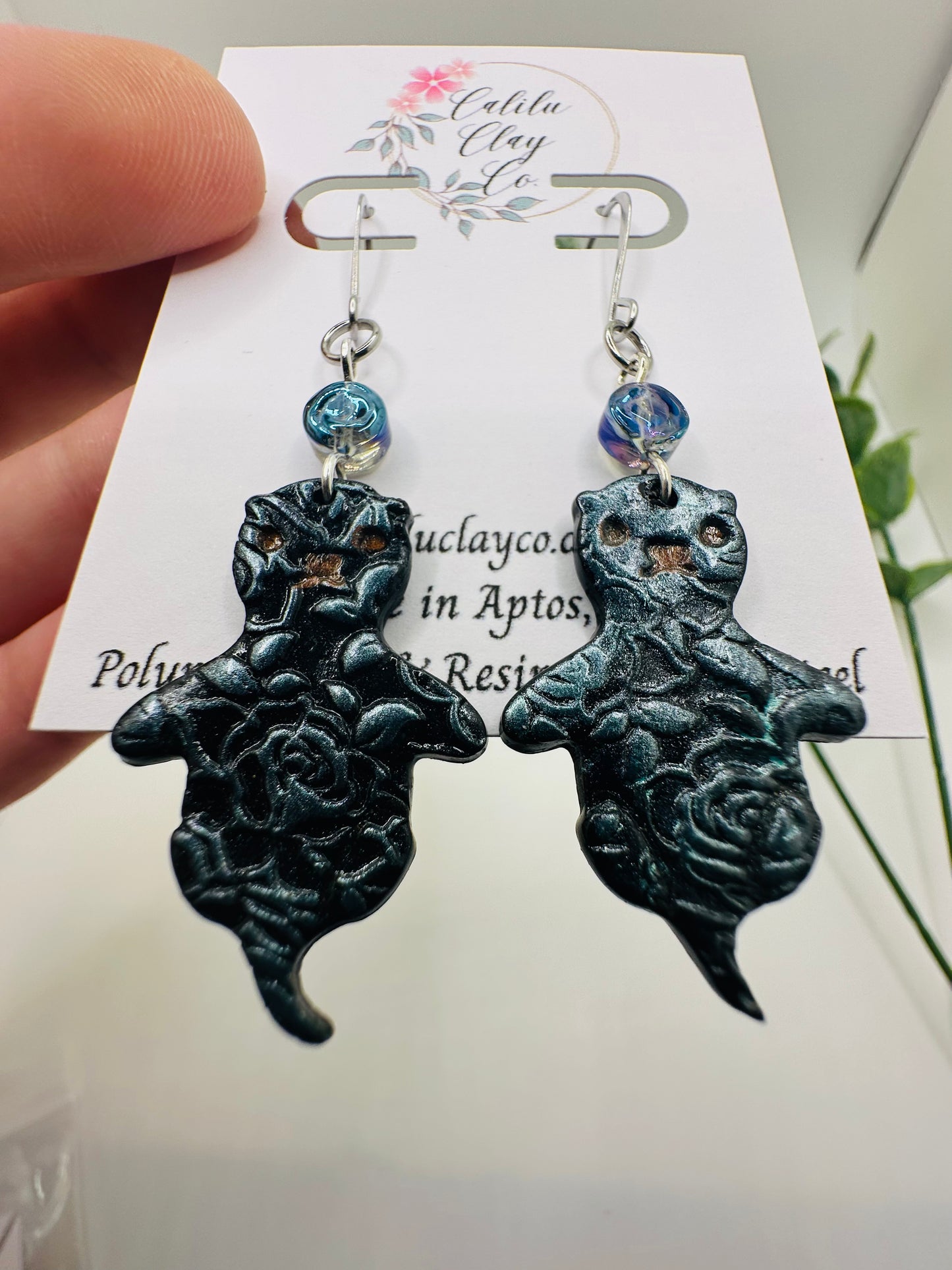 Blue and Black Sea Otters with Roses Dangles