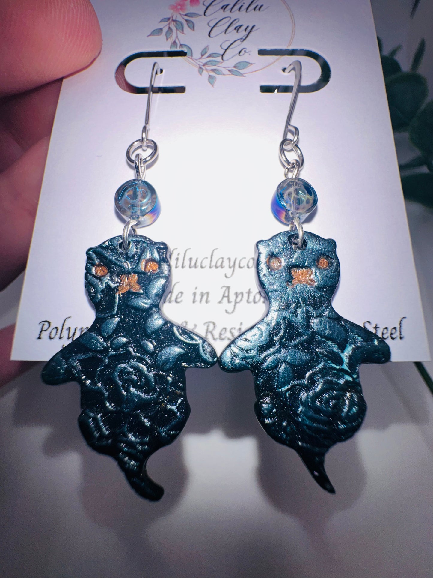 Blue and Black Sea Otters with Roses Dangles