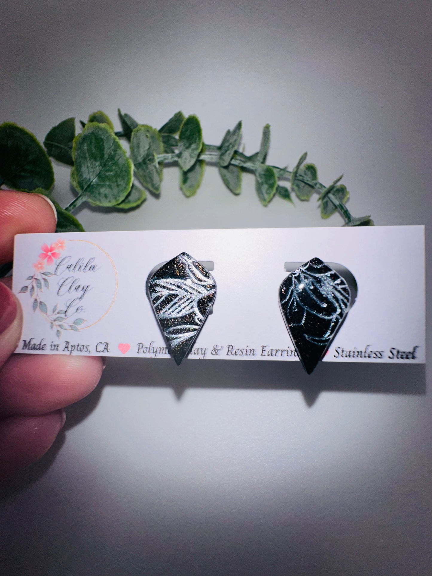 Black Studs with Silver Leaf Imprint