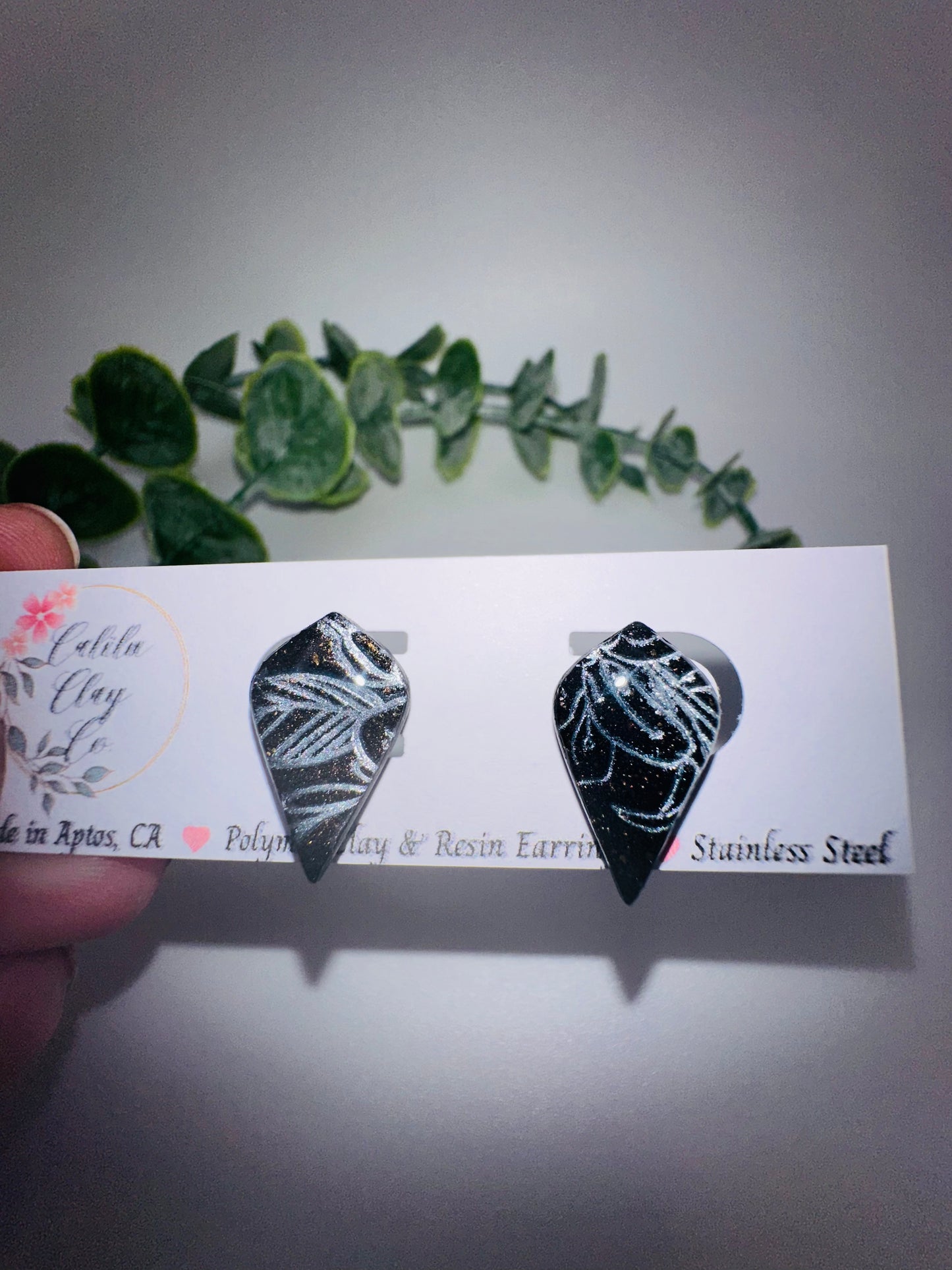 Black Studs with Silver Leaf Imprint