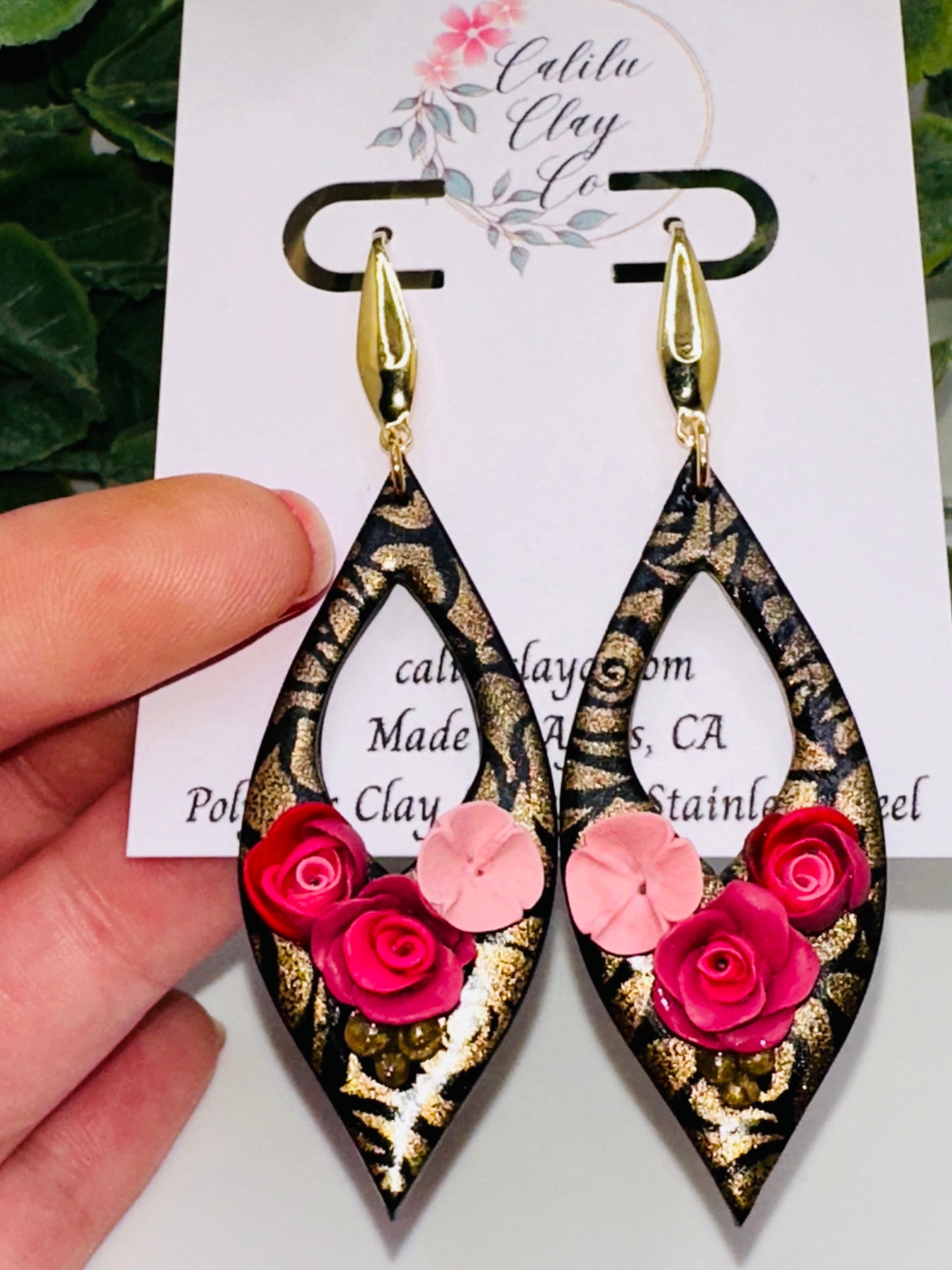 Sculpted Roses on Long Gold and Black Dangles